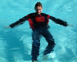 lifesaving swimming in clothes